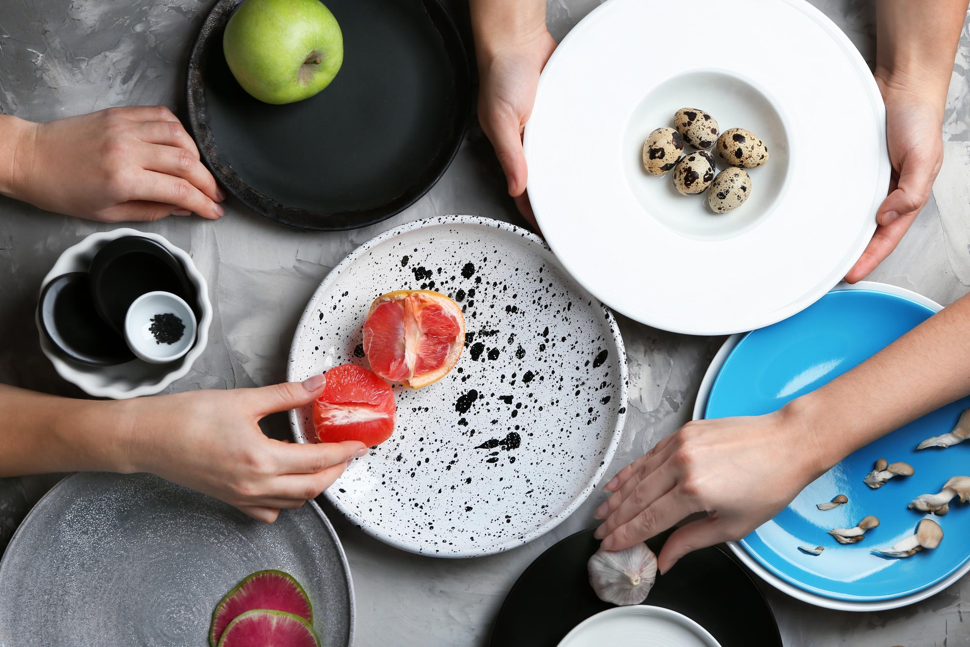 Workshop table with plated dishes and utensils